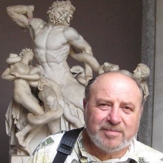 Ilya Rybak in front of a classical sculpture